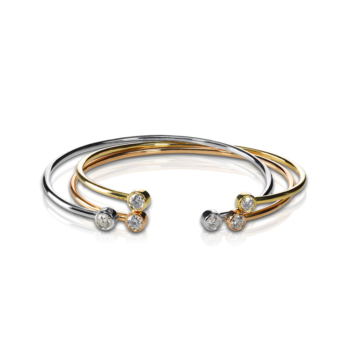 set of three colored gold and diamond